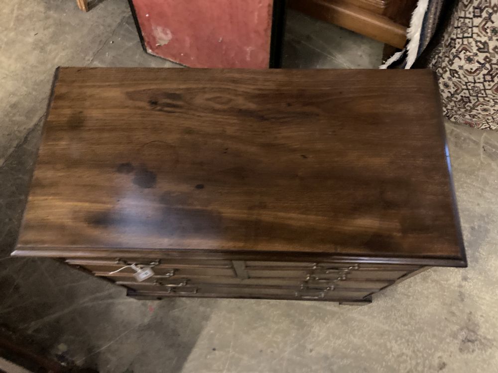 A George III style mahogany cabinet with deep lower drawer, width 80cm, depth 40cm, height 79cm